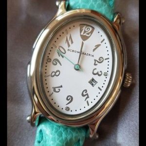 BCBG watch with leather strap and white face